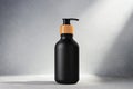 Black bottle with dispenser pump for liquid soap, gel, lotion, cream, shampoo and other cosmetics Royalty Free Stock Photo