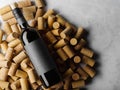 Black bottle of red wine, on corks .on white background, for text advertising, banner Royalty Free Stock Photo
