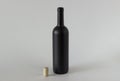 Black bottle and stopper on a white background Royalty Free Stock Photo