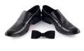 Black bow and men's classic shoes isolated