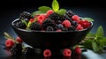 a black bowl filled with berries and raspberries next to mint leaves. generative ai Royalty Free Stock Photo