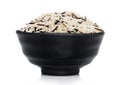 Black bowl of raw organic basmati long grain and wild rice on white background. Healthy food Royalty Free Stock Photo