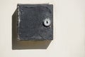 Black box with a lock on the white wall Royalty Free Stock Photo