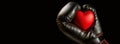 Black Boxing Glove Holding a Red Heart on a Black Background - Generative Ai Royalty Free Stock Photo