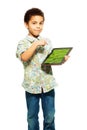 Black boy shows photo on tablet computer Royalty Free Stock Photo