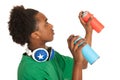 Black boy spraying graffiti Royalty Free Stock Photo