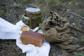 Bread and military flask on a white towel