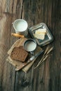 Black bread and milk on old wooden