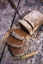Black bread on a wooden background Royalty Free Stock Photo