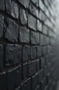 Black brick wall texture with focus on the rough surface. Dark, aged stone, construction background. Building wall for design. Royalty Free Stock Photo