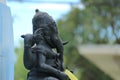 Black bronze statue of Lord Ganesha according to Hindu beliefs, sacred