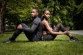 Black brother and sister twins doing exercise outdoors in stylish sportswear Royalty Free Stock Photo