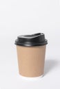 Black brown coffee paper cup on gray background. mock up for branding Royalty Free Stock Photo