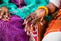 Black and Brown Henna Hands Drawings on Women for African Wedding Ceremony. Royalty Free Stock Photo