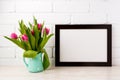 Black brown landscape frame mockup with magenta tulips in mint Royalty Free Stock Photo