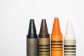 Black, Brown, Orange and White crayons Royalty Free Stock Photo