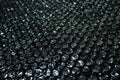 Black Bubble Wrap Packaging Texture with Glossy Plastic Air Cushions Royalty Free Stock Photo