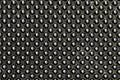 Black bumpy rubber surface used as a background. Black and white texture of rubber material with copy space. Bubble dots backgroun