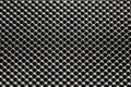 Black bumpy rubber surface used as a background. Black and white texture of rubber material with copy space. Bubble dots backgroun