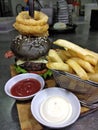 the black burger and chips Royalty Free Stock Photo