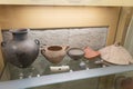 Black burnished jar, bowl, terracotta whorl and other pieces of ancient greek culture in a meseum