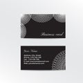 Black business card decorated white lacework