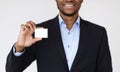 Black businessman handing blank business card on white background Royalty Free Stock Photo