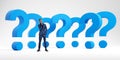 Black businessman standing near blue question marks in row, idea or problem