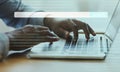 Black Businessman Using Laptop Browsing Internet Working In Office, Cropped