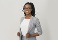 Black Businesswoman Smiling At Camera Standing Over Gray Background Royalty Free Stock Photo