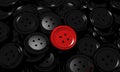 Black button clothes and one unique red Royalty Free Stock Photo