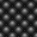 Black buttoned leather upholstery pattern texture