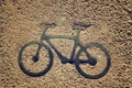 Black bycicle sign on lanes asphalt road. Royalty Free Stock Photo