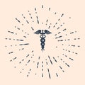 Black Caduceus medical symbol icon on beige background. Medicine and health care concept. Emblem for drugstore or Royalty Free Stock Photo