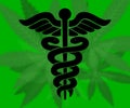 Black caduceus sign on marijuana background