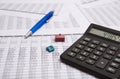 Black calculator, pen, small house Royalty Free Stock Photo