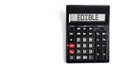 Black calculator with text EDIBLE on the white background