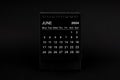 Black Calendar for June 2024 . Desktop calendar on a black