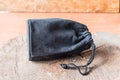 Black camera lens bag on wood Royalty Free Stock Photo