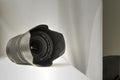 Black camera zoom lens on white cloth Royalty Free Stock Photo