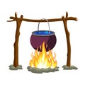 Black camping pot over a bonfire Royalty Free Stock Photo