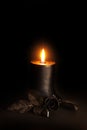Black candle, black rose, glass heart. Royalty Free Stock Photo