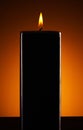 Black candle on dark Royalty Free Stock Photo