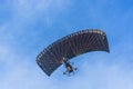 Black canopy powered tandem para glider
