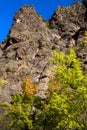 Autumn colors, steep cliffs, and blue skies at Black Canyon of the Gunnison National Park Royalty Free Stock Photo