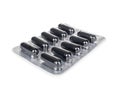 Black capsules in the package Royalty Free Stock Photo