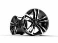 Black car alloy wheel, isolated over white background 3D rendering illustration. Royalty Free Stock Photo