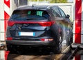 Black car in automatic car wash