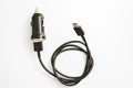 black car charger with USB output connection cable. A photo taken on a black car charger with USB output connection cable against Royalty Free Stock Photo