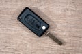 Black car key on wooden desk Royalty Free Stock Photo